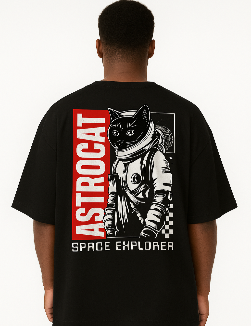 Person wearing a black t-shirt with 'ASTROCAT SPACE EXPLORER' design on the back.